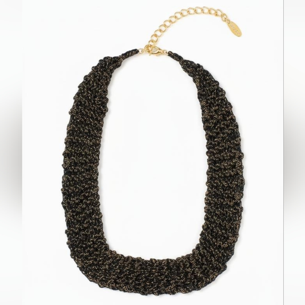 Saachi necklace. Black and gold lace metal.